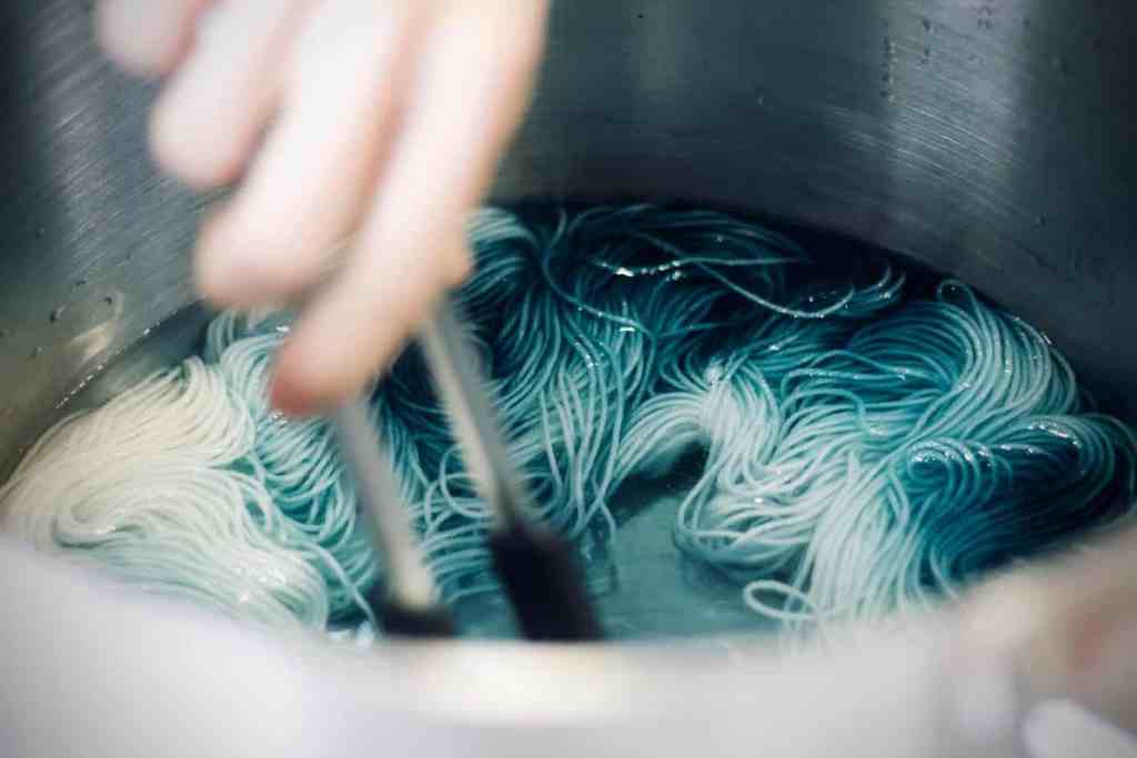 Eco Friendly and Sustainable Crochet Guide Image Yarn being dyed