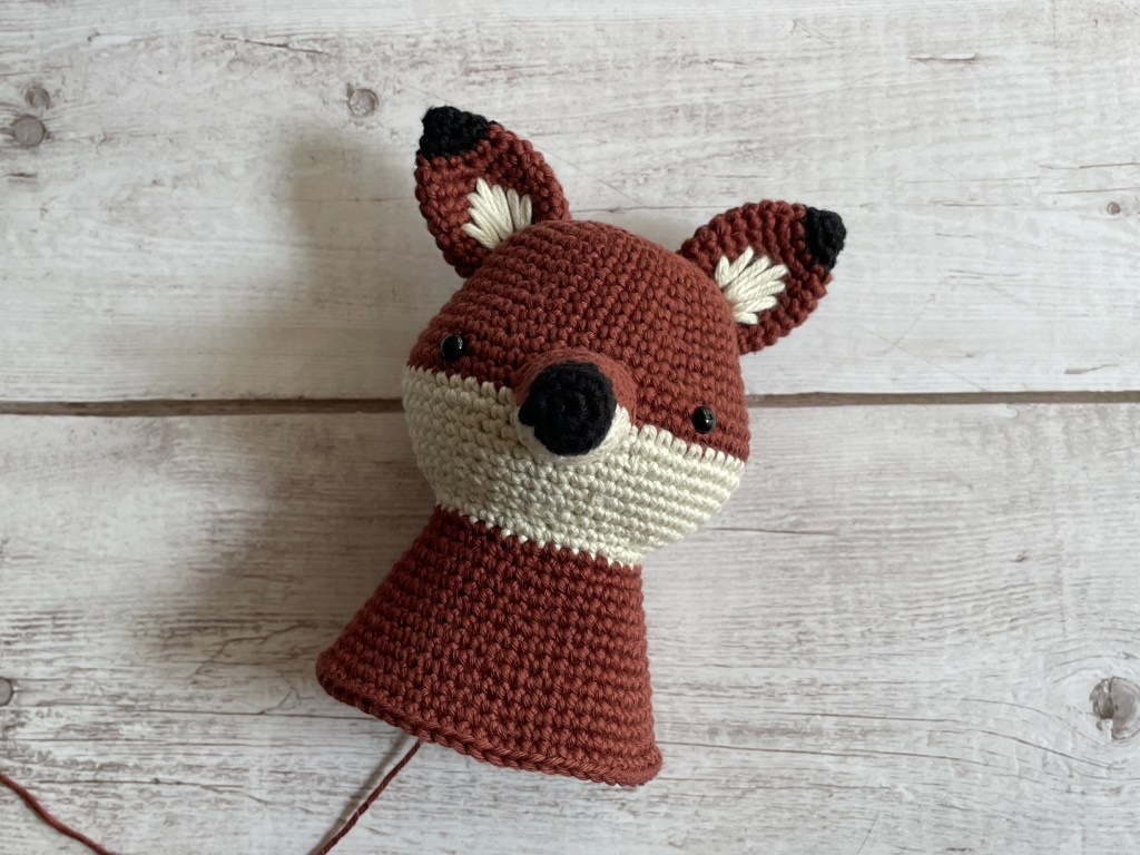 Fox crochet pattern in the making - head and face
