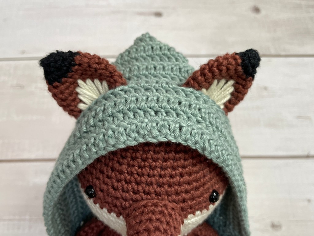 Fox crochet pattern in the making - ears through hood