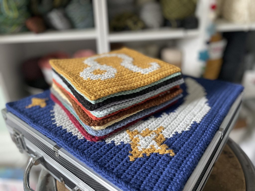 Close up of individual tiles for crochet tapestry tiles