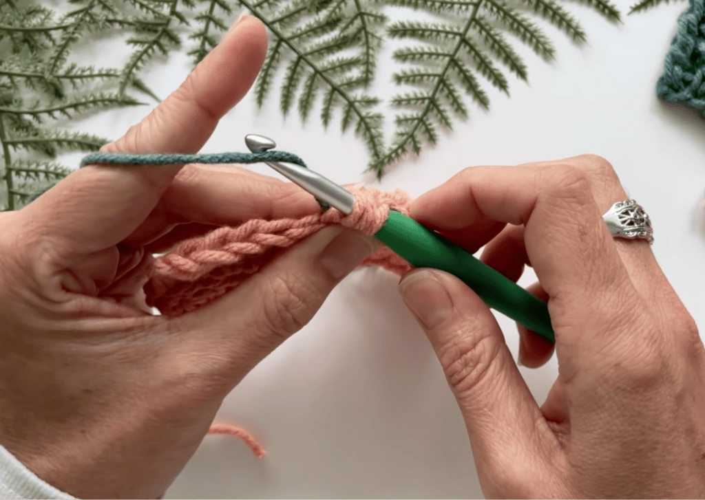 how to change colors in crochet - pull through with the new color during the final yarn over